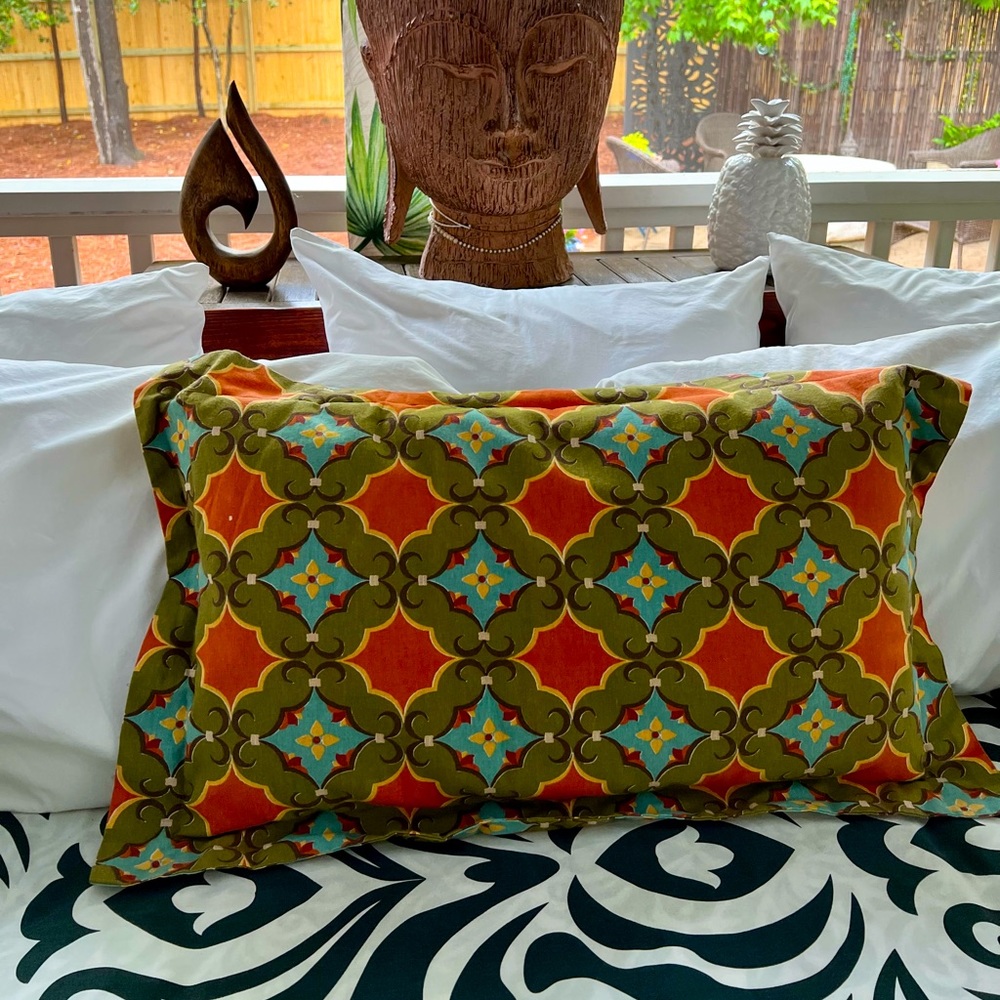 Oblong pillow cover, same print on both sides Orange blue and green.
